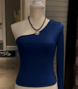 Photo of a model wearing the D&A Iris One Shoulder Fitted Top Royal Blue.